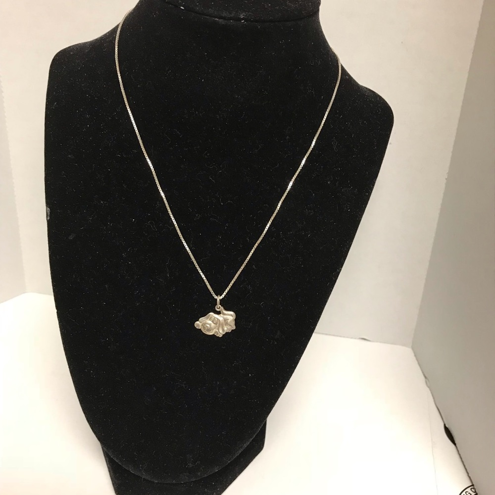 James Avery silver dog pendant stamped